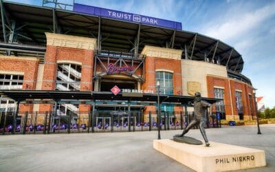Exterior entrance to Truist Park with a statue of Phil Niekro pitching